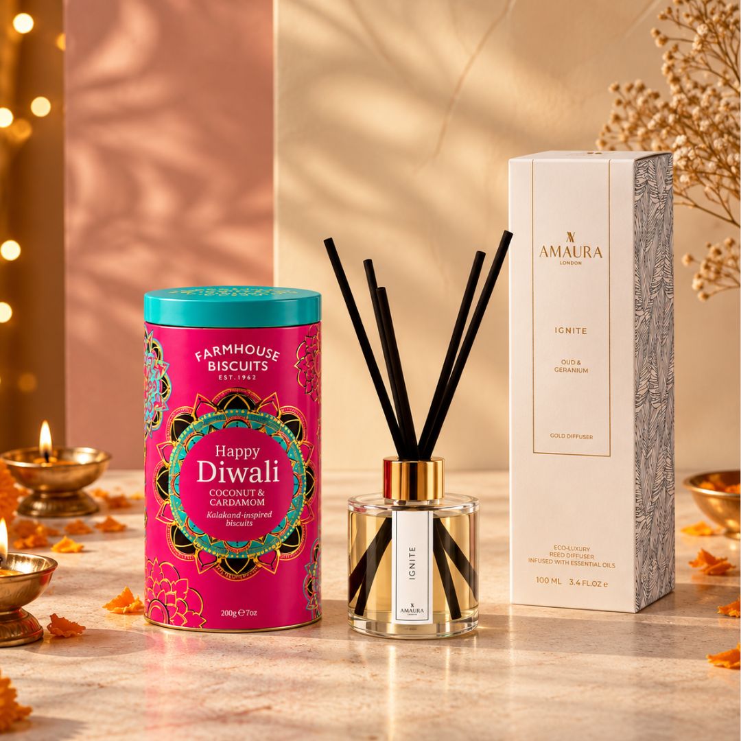 Ignite oud and geranium reed diffuser with a pink Diwali biscuit tin, an Amaura London gift set